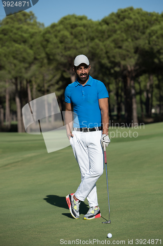 Image of golf player portrait at course