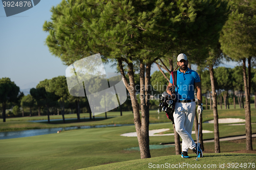 Image of golf player portrait at course