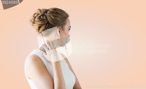 Image of close up of beautiful woman with ring and earring