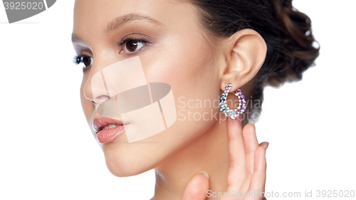 Image of close up of beautiful woman face with earring