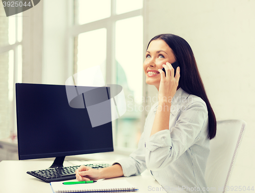 Image of smiling businesswoman or student with smartphone