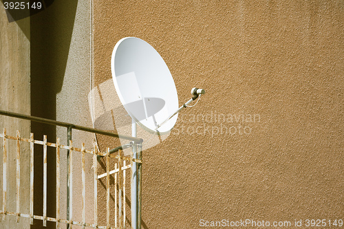 Image of satellite dish at a balcony
