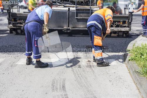 Image of Workers on Asphalting Road 