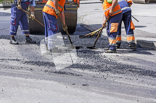 Image of Workers on Asphalting Road 