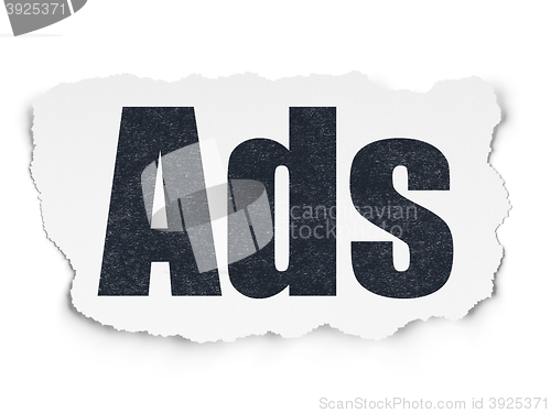 Image of Advertising concept: Ads on Torn Paper background