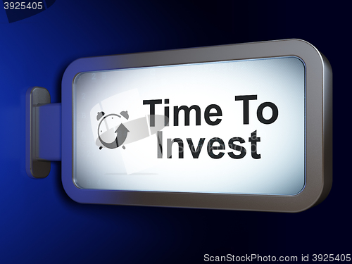 Image of Timeline concept: Time To Invest and Alarm Clock on billboard background