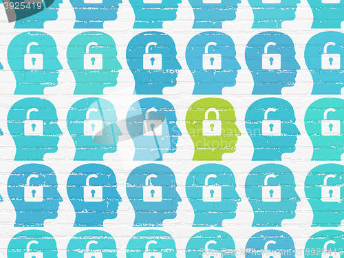Image of Business concept: head with padlock icon on wall background
