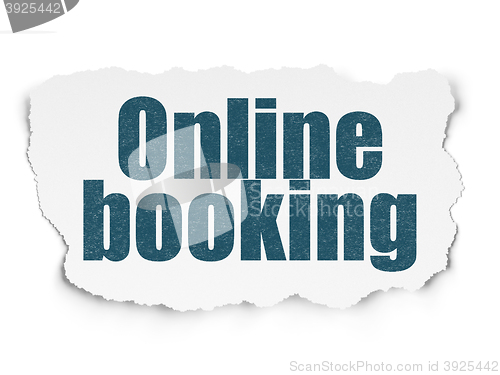 Image of Vacation concept: Online Booking on Torn Paper background