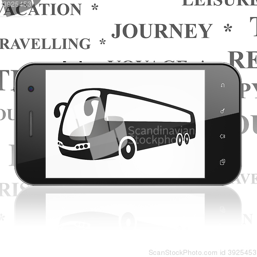Image of Vacation concept: Smartphone with Bus on display