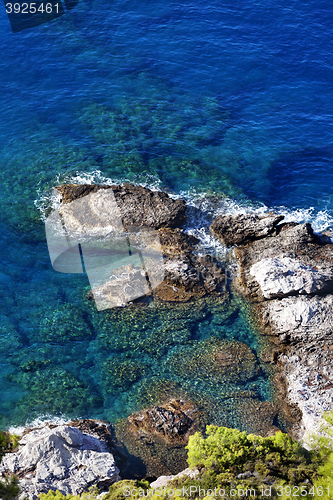 Image of Top view on blue clear sea at sun day