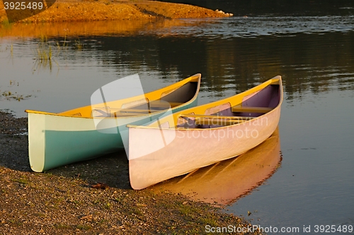 Image of Canoes on the Riverside