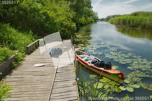 Image of Canoe on the riverside