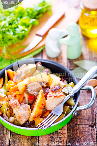 Image of fried meat with vegetables