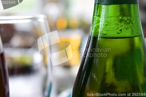 Image of Close up picture of bottle of beer and glass