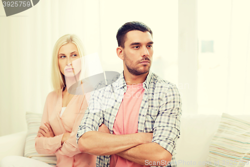 Image of unhappy couple having argument at home