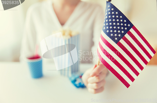 Image of close up of woman holding american flag