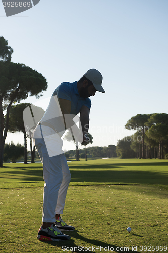 Image of golf player hitting shot