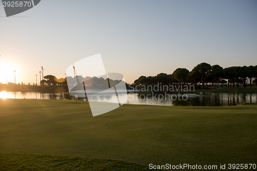 Image of golf course on sunset