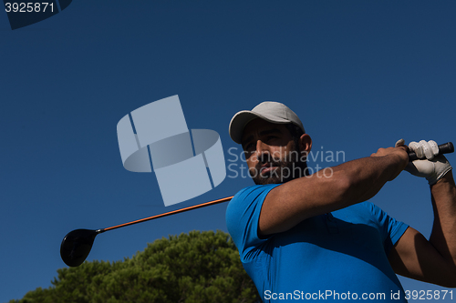 Image of golf player hitting shot