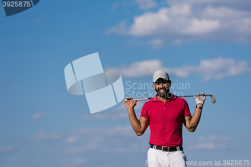 Image of handsome middle eastern golf player portrait at course