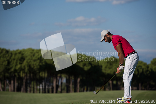 Image of golf player hitting long shot