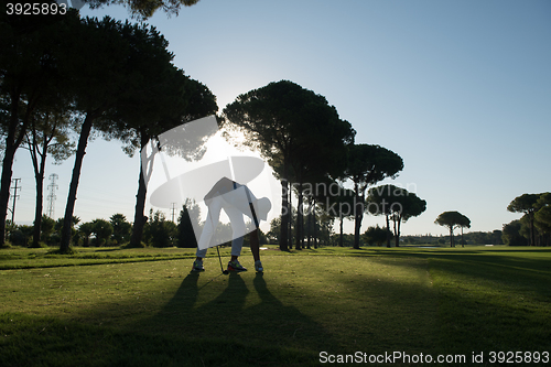 Image of golf player hitting shot