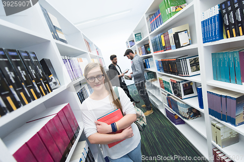 Image of students group  in school  library