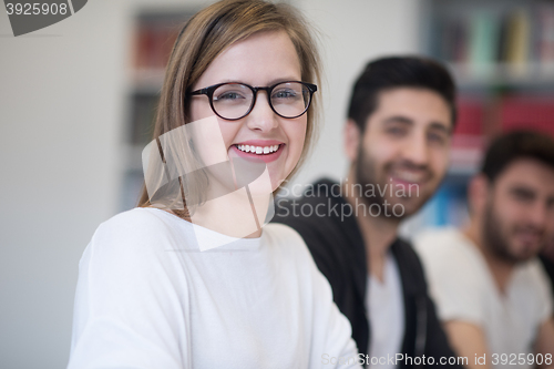 Image of group of students study together in classroom