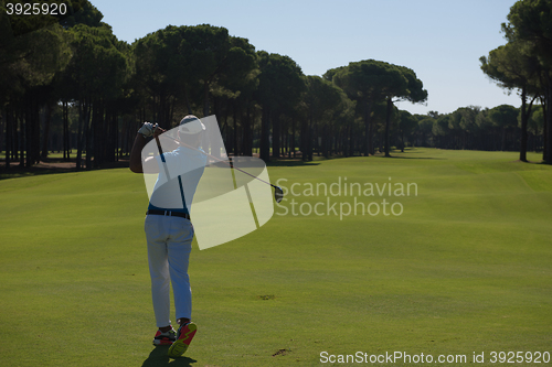 Image of golf player hitting shot