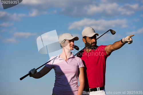 Image of portrait of couple on golf course