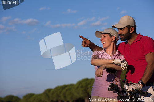 Image of portrait of couple on golf course