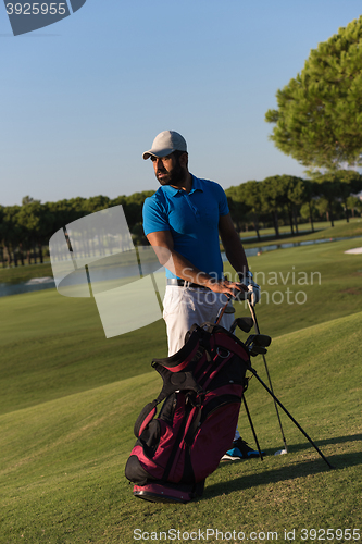 Image of golfer  portrait at golf course