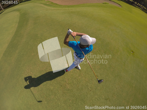 Image of top view of golf player hitting shot