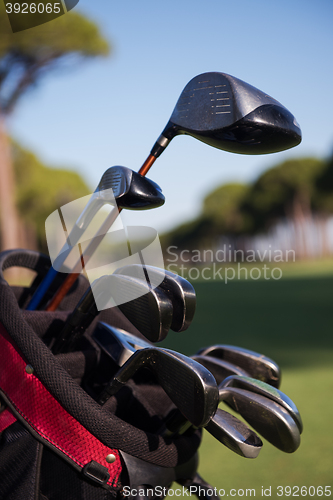 Image of close up golf bag on course