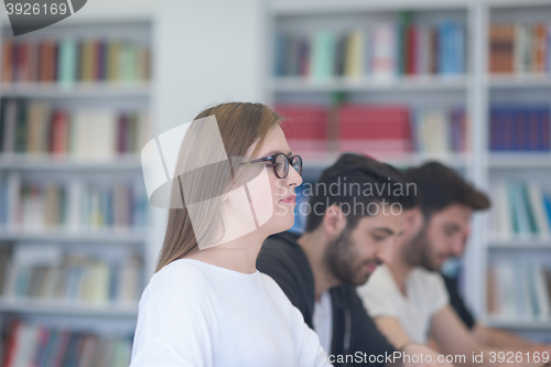 Image of group of students study together in classroom