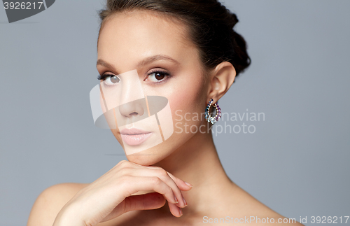 Image of close up of beautiful woman face with earring