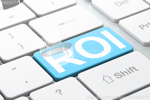 Image of Business concept: ROI on computer keyboard background