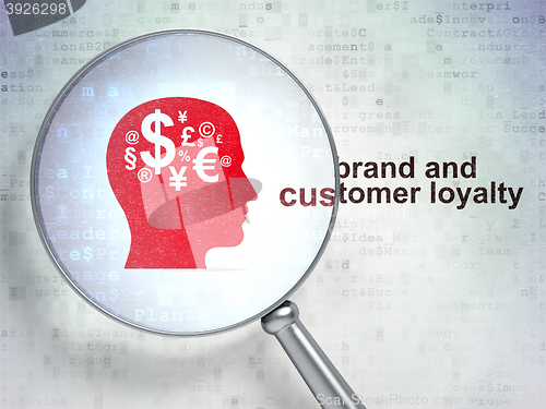 Image of Advertising concept: Head With Finance Symbol and Brand and Customer loyalty with optical glass