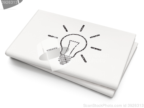 Image of Business concept: Light Bulb on Blank Newspaper background