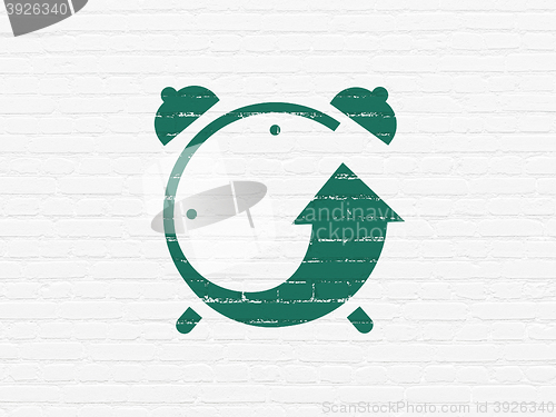 Image of Time concept: Alarm Clock on wall background