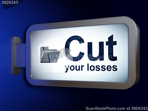 Image of Finance concept: Cut Your losses and Folder on billboard background