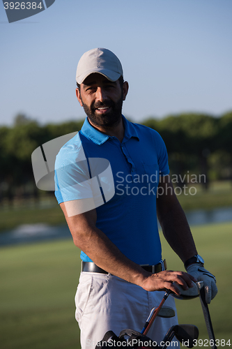 Image of golfer  portrait at golf course