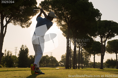 Image of golf player hitting shot