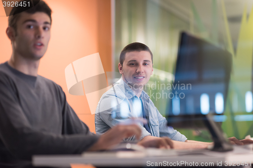 Image of technology students group working  in computer lab school  class