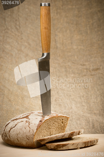 Image of A slice of bread with butter 