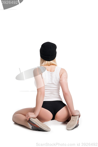 Image of Female model in tank top and briefs showing her back isolated