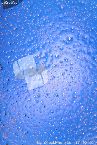 Image of crystals in a blue plastic