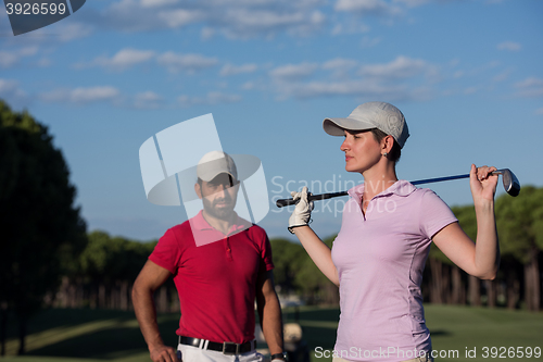 Image of portrait of couple on golf course