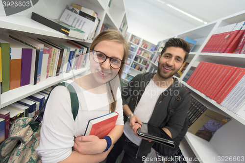 Image of students group  in school  library