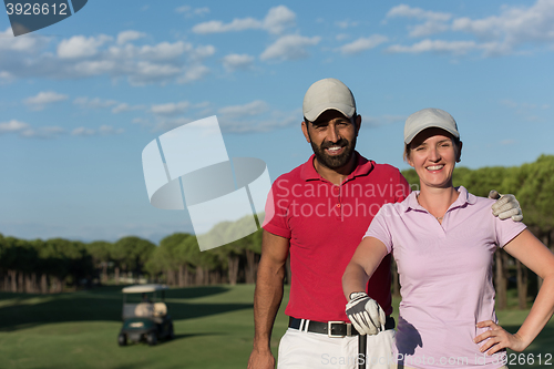 Image of portrait of couple on golf course